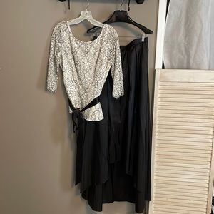 Formal peplum shirt and black skirt combo.